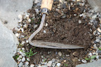 If you scrape the gravel, you reveal the soil beneath.