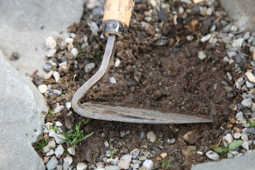 If you scrape the gravel, you reveal the soil beneath.