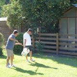 Gary and Brian pick up dog poop.