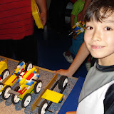 Kai races his creation in the Build and Test Center