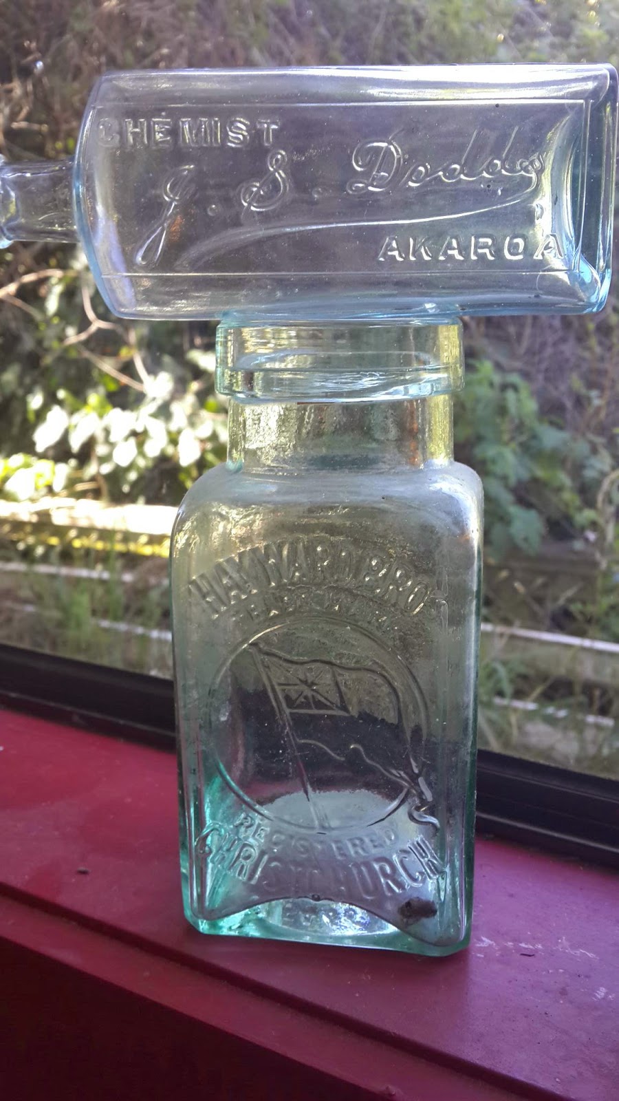 Have twins will travel Old Nz glass bottles