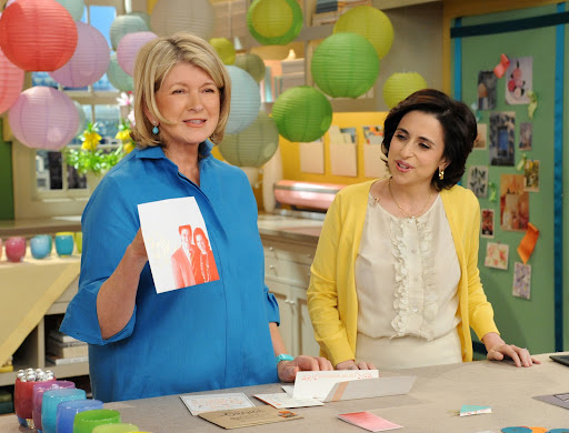 Martha holds up the adorable envelope from Cheree Berry's wedding (www.chereeberry.com).