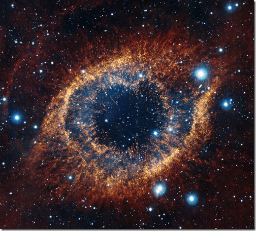 Infrared/visible light comparison view of  the Helix Nebula