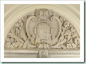 Stone carvings around and over the chimney-piece with the coat of arms of William Bankes (sable, a cross engrailed ermine, between four fleur-de-lys or), quartered with those of Wynne and Brune, and with the family motto 'Velle Quod Vult Deus' (Desire wha Stone carvings around and over the chimney-piece with the coat of arms of William Bankes (sable, a cross engrailed ermine, between four fleur-de-lys or), quartered with those of Wynne and Brune, and with the family motto 'Velle Quod Vult Deus' (Desire wha