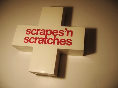 Scrapes n scratches first aid box by David L. Romanoff