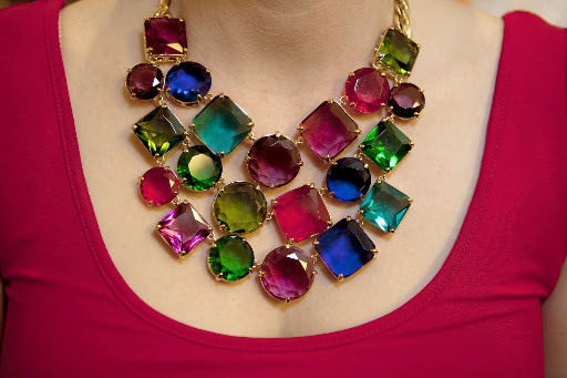 Her Kate Spade necklace captured the confetti theme. Her Kate Spade necklace captured the confetti theme.