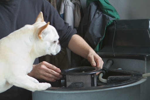 Then, lower the Compost Basket into the system. Then, lower the Compost Basket into the system.