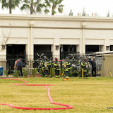 Initially reported as a structure fire, this ended up being a vehicle fire next to a cafe. Long hose lay... SacFD had to hand-jack a supply to the fire. Work van was a total loss, no damage to the building. News_120126_VehicleFire_Natomas_#121129