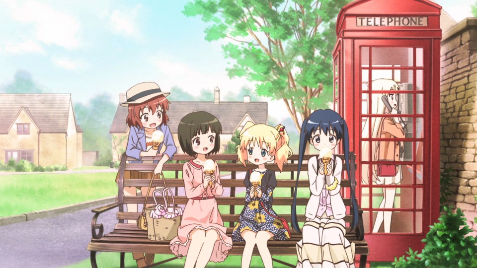 The girls sit on a bench eating ice cream cones together while Karen uses a traditional British phone booth behind them