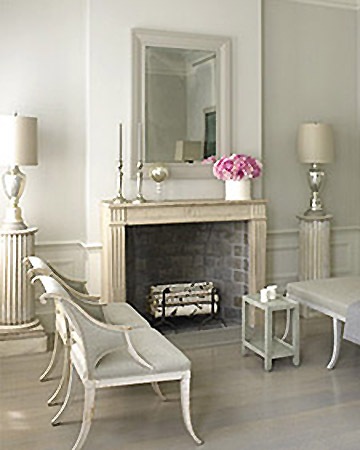 When he renovated his new apartment, Eric chose soothing shades of gray and made a decorative fireplace a focal point in the living room. The 19th-century French limestone piece was a gift from Martha Stewart.
