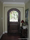 Interior view of beveled copper came diamond entry door in private residence in Menlo Park, CA