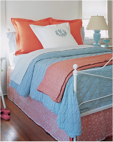 I appreciate the orange repeat on this bed.