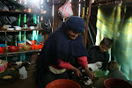 Hanging out in the warmth of the kitchen at the only building(home/­restaurant/lodge) between Congon and Choctamal, Gran Vilaya Trek, Chachapoyas Region, Peru