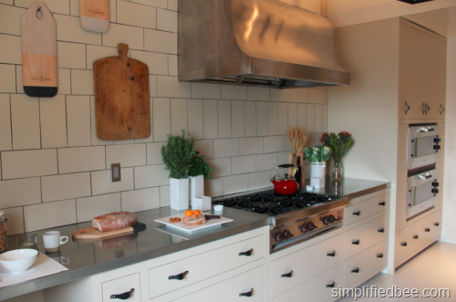 white_kitchen_tile_backsplash_zinc_counters