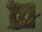 Even the switch plate had a mermaid on it.