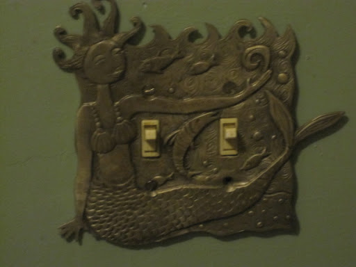 Even the switch plate had a mermaid on it.
