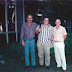Foto tirada no Campus da UFPA, próximo do Laboratório de Pesquisa do Departamento de Física, em 1997. Da esquerda para a direita: Paulo de Tarso, Alberto Santoro e Bassalo.