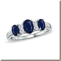 Oval Sapphire and Diamond Three Stone Ring