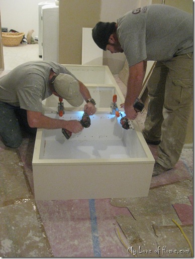 Installing upper cabinets on the floor