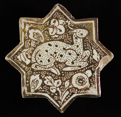 Tile | Origin: Iran, Kashan | Period: Early to mid-13th century | Collection: The Nasli M. Heeramaneck Collection, gift of Joan Palevsky (M.73.5.374) | Type: Ceramic; Architectural element, Fritware, overglaze luster-painted, Height: 4 1/2 in. (11.43 cm)