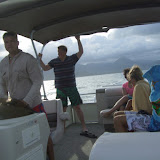 James, my couchsurfing host driving a boat