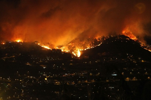 Fires rage above Funchal in Madeira, 20 July 2012. AFP / Getty