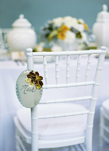 Mirrors were hung on the backs of chairs.