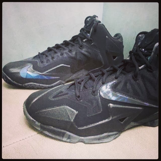 all black lebrons 11