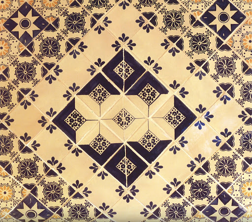 Polished Talavera tiles in a classic trio of navy, white and yellow. Polished Talavera tiles in a classic trio of navy, white and yellow.