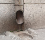 My picture from Helsinki above. Another dane have pictured a downspout at wintertime, look here: http://www.flickr.com/photos/biedk/3292975819/in/set-72157613515655490/