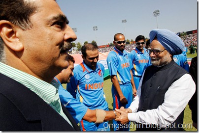 Prime Minister Manmohan Singh of India shakes hands with Sachin Tendulkar of India as Prime Minister Syed Yusuf Raza Gilani of Pakistan looks on prior to the start of the 2011 ICC World Cup second Semi-Final