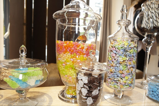 The J.Crew team set up a fun candy bar for the guests attending the store opening. The J.Crew team set up a fun candy bar for the guests attending the store opening.