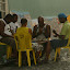 These hardcore local gangsters were attempting to magnify their ill gotten gains through a blood thirsty game of... dominoes. John, this photo was for you!
