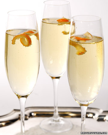 Mandarin Cocktail: A splash of mandarin liqueur and a citrus peel garnish make a glass of Champagne feel even more special.