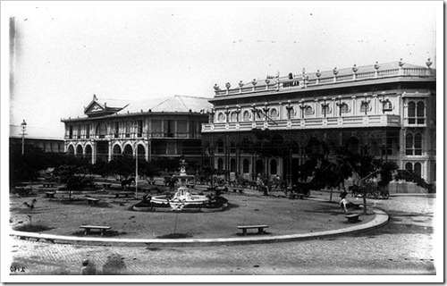 Hotel de Oriente (left) and La Insular Cigar and Cigarette Factory (right) in the early 1900s
