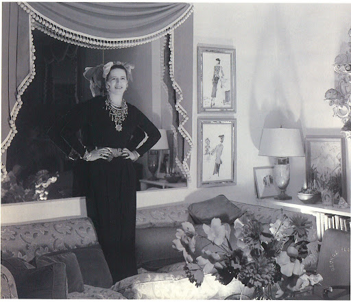 Diana Vreeland in her Park Avenue apartment. I love her playful personal style, the curtain-framed mirror, the framed Bébé Bérard drawings, and the fact that she doesn't take her living space too seriously (notice she's standing atop her sofa). Diana Vreeland in her Park Avenue apartment. I love her playful personal style, the curtain-framed mirror, the framed Bébé Bérard drawings, and the fact that she doesn't take her living space too seriously (notice she's standing atop her sofa).