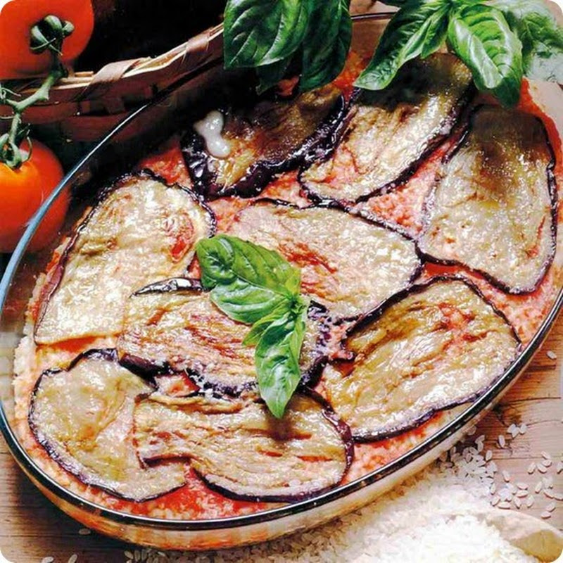 La storia e le origini della Parmigiana di melanzane.