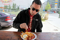 Eating a currywurst