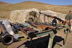 An assortment of weapons ranging from an RPG launcher to pistols