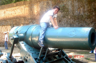 Sir Jeff rides on top of a big cannon.