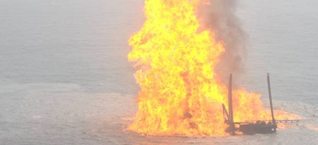 Disaster site: The KS Endeavor rig, pictured here ablaze following the January 2012 blowout. upstreamonline.com