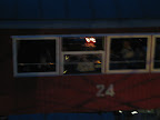 Blurry shot of the opposite gondola, the occupants were eating dinner.