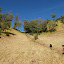 Porters and hikers climbing out of the campsite