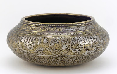 Bowl | Origin:  Iran | Period: early 14th century | Details:  Not Available | Type: Brass, inlaid with silver, gold and a black organic material | Size: H: 7.2  W: 16.6   D: 16.6  cm | Museum Code: F1949.11 | Photograph and description taken from Freer and the Sackler (Smithsonian) Museums.