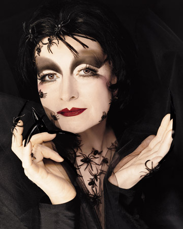 Black Widow: Dressed as a Black Widow for the cover of the 2000 Halloween issue, Martha shows Halloween makeup at its most glamorous and spine-tingling. Her look, achieved with makeup techniques and prosthetic features, was topped off with a swarm of spiders and a set of menacing black nails.