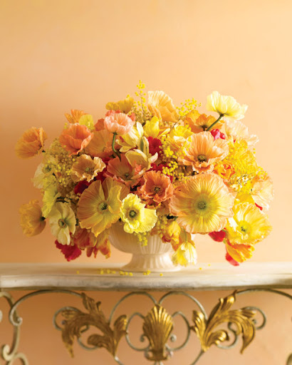 The orange colors in this flower arrangement remind me of a refreshing sherbet. (Martha Stewart Living)