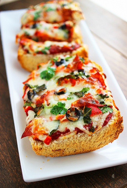 French Bread Pizzas – Just like the frozen kind, but 10x more delicious and wholesome! | thecomfortofcooking.com
