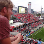 watching the match Toronto FC vs New England Revolution in Toronto, Ontario, Canada