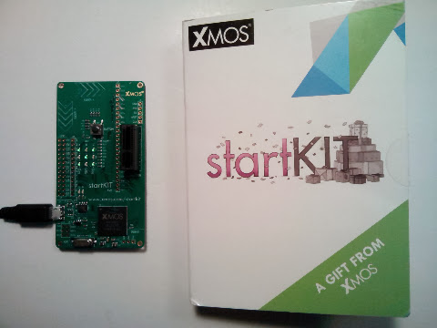 XMOS StartKIT board and its shipping box.