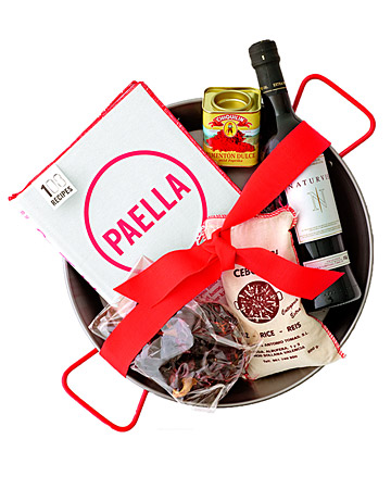 As a houseguest, one of the greatest gifts you can offer -- aside from pitching in to clean dishes -- is to give your host a night off from menu planning. This paella pan holds almost everything you need to concoct that savory rice dish, including a book of 108 recipes, specialty Bomba rice, Spanish paprika and olive oil, and dried chiles. Come dinnertime, just add protein. As a houseguest, one of the greatest gifts you can offer -- aside from pitching in to clean dishes -- is to give your host a night off from menu planning. This paella pan holds almost everything you need to concoct that savory rice dish, including a book of 108 recipes, specialty Bomba rice, Spanish paprika and olive oil, and dried chiles. Come dinnertime, just add protein.